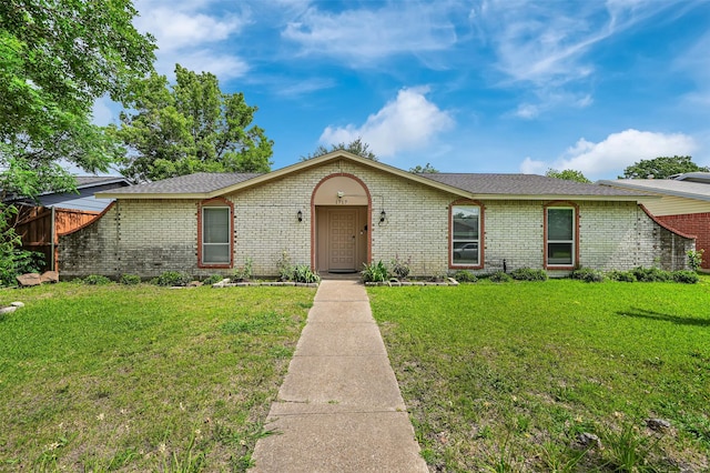 1717 Melrose St, Garland, TX 75042 - ranch-style house with brick siding, a front lawn, and roof with shingles