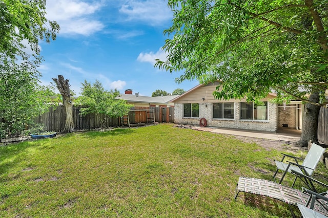 1717 Melrose St, Garland, TX 75042 - view of yard featuring a patio area