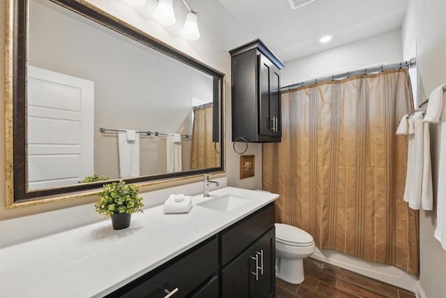 2172 Knightsgate Rd, Argyle, TX 76226 - full bath with wood finish floors, toilet, vanity, and a shower with shower curtain