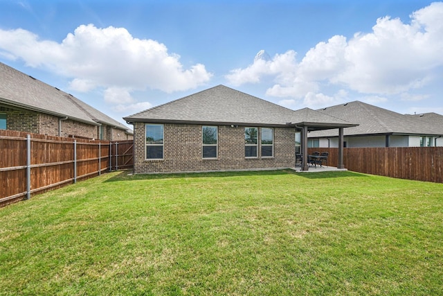 2172 Knightsgate Rd, Argyle, TX 76226 - rear view of property featuring a patio, brick siding, and a shingled roof