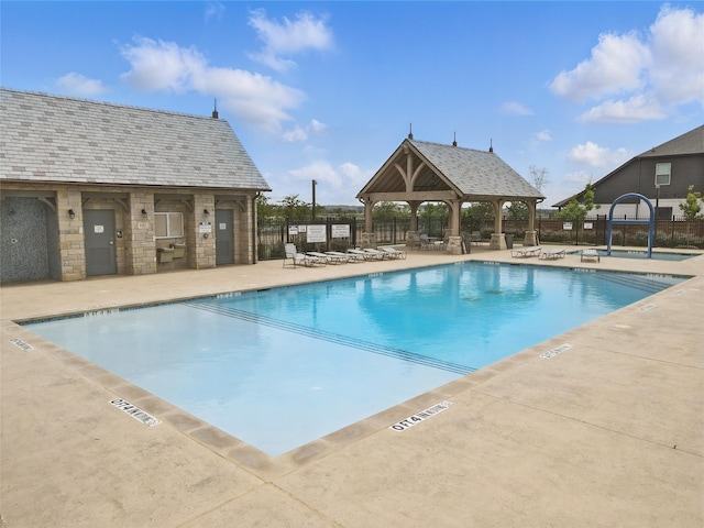 2172 Knightsgate Rd, Argyle, TX 76226 - community pool featuring a gazebo, fence, and a patio