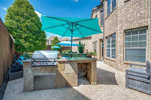 13348 Torrington Dr, Frisco, TX 75035 - view of patio featuring a grill, area for grilling, and a fenced backyard