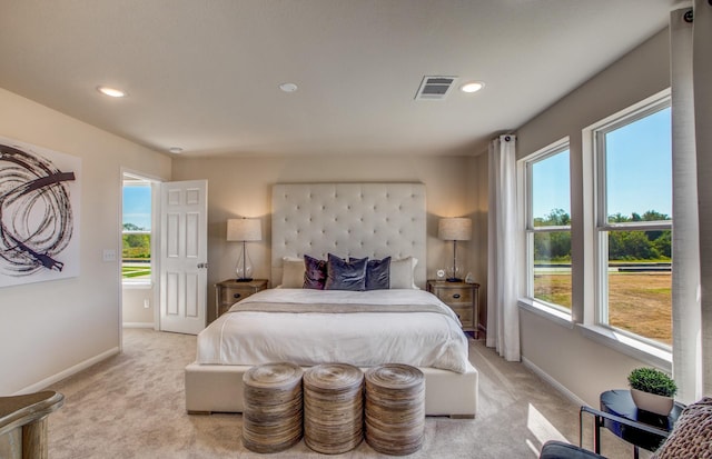 1043 Clear Dusk Ln, Forney, TX 75126 - bedroom with multiple windows, light colored carpet, baseboards, and recessed lighting