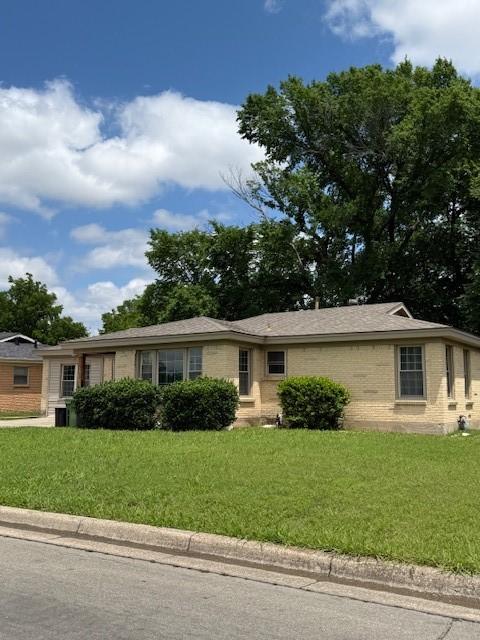 3524 Paramount St, North Richland Hills, TX 76117 - single story home with a front lawn and brick siding