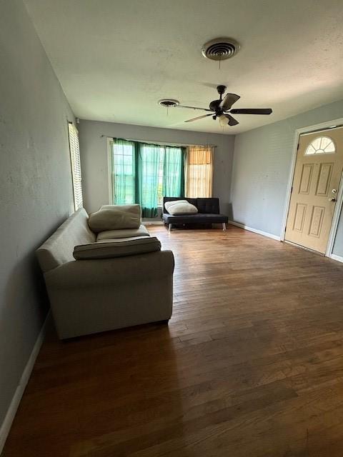 3524 Paramount St, North Richland Hills, TX 76117 - living area with baseboards, wood finished floors, and ceiling fan