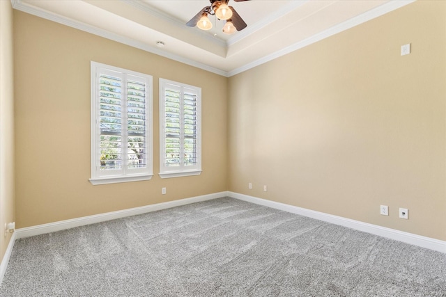 1085 Forest Bend Ct, Cross Roads, TX 76227 - spare room featuring ornamental molding, carpet floors, a ceiling fan, baseboards, and a tray ceiling