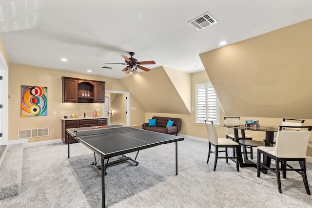 1085 Forest Bend Ct, Cross Roads, TX 76227 - recreation room featuring light carpet, baseboards, lofted ceiling, ceiling fan, and bar area