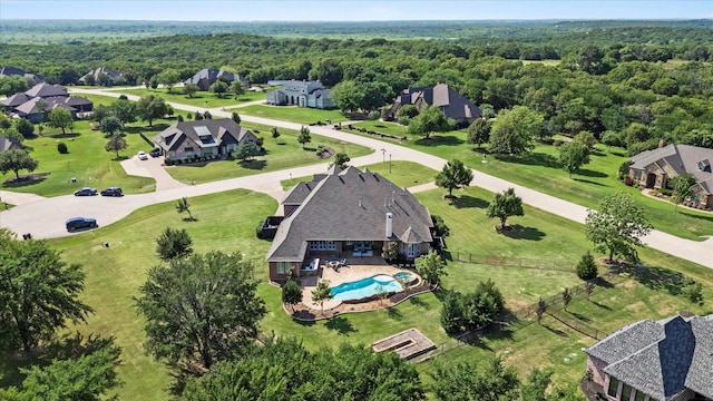 1085 Forest Bend Ct, Cross Roads, TX 76227 - aerial view of residential area featuring a pool and a heavily wooded area