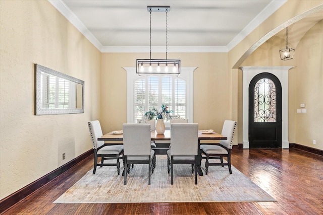 1085 Forest Bend Ct, Cross Roads, TX 76227 - dining area featuring arched walkways, wood finished floors, ornamental molding, baseboards, and a chandelier
