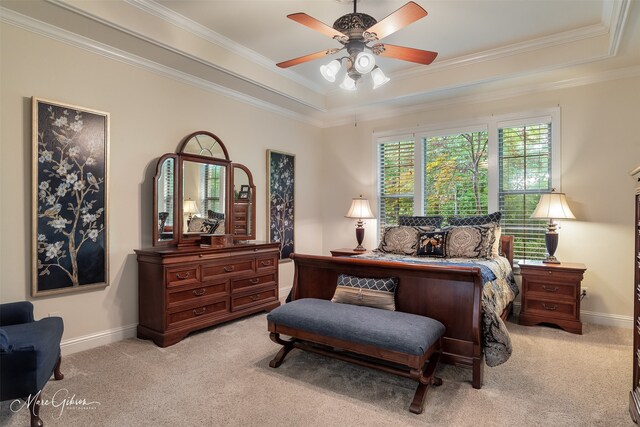 27 Wilshire Dr, Bossier City, LA 71111 - bedroom with a tray ceiling, light colored carpet, baseboards, ornamental molding, and ceiling fan