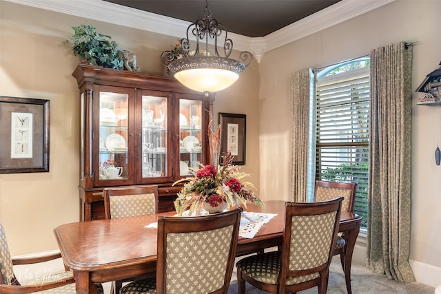 27 Wilshire Dr, Bossier City, LA 71111 - carpeted dining room featuring healthy amount of natural light, crown molding, and baseboards