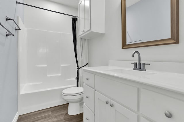 421 E Shepherd St, Denison, TX 75021 - bathroom featuring toilet, wood finished floors, vanity, and shower / bathtub combination with curtain