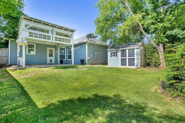 421 E Shepherd St, Denison, TX 75021 - rear view of house featuring a shed, a patio, and an outdoor structure