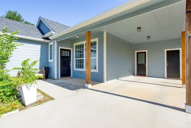 421 E Shepherd St, Denison, TX 75021 - view of patio / terrace with driveway and an attached carport