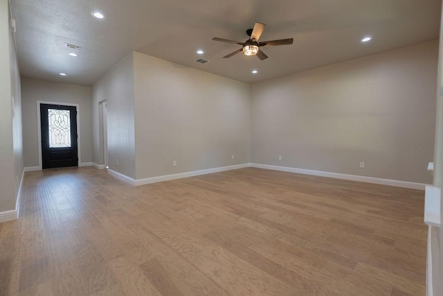 914 S Brazos St, Weatherford, TX 76086 - foyer featuring light wood-style flooring, a ceiling fan, baseboards, and recessed lighting