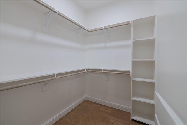 914 S Brazos St, Weatherford, TX 76086 - spacious closet featuring wood finished floors