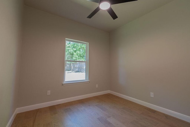 914 S Brazos St, Weatherford, TX 76086 - unfurnished room featuring wood finished floors, ceiling fan, and baseboards