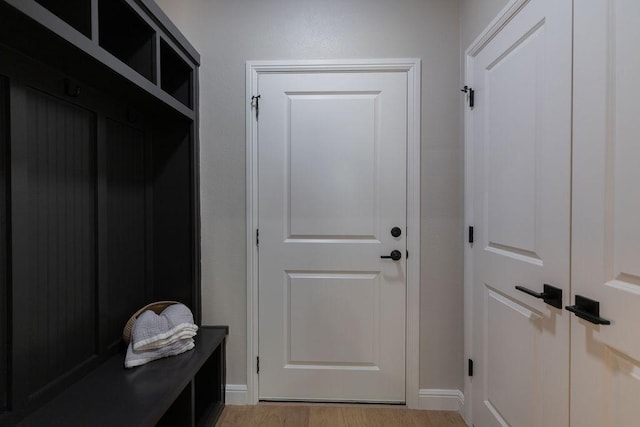 914 S Brazos St, Weatherford, TX 76086 - mudroom featuring light wood-type flooring and baseboards