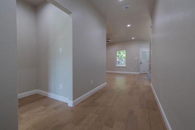 914 S Brazos St, Weatherford, TX 76086 - hallway with light wood finished floors, recessed lighting, and baseboards