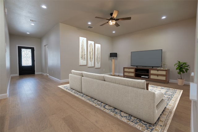 914 S Brazos St, Weatherford, TX 76086 - living room with a ceiling fan, recessed lighting, baseboards, and light wood-style floors