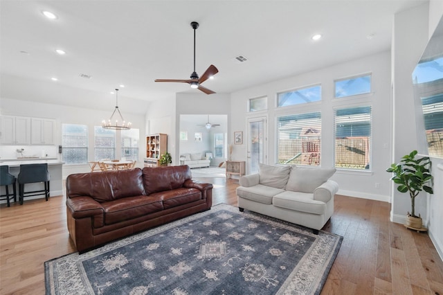 1105 Collared Dove Dr, Little Elm, TX 75068 - living area featuring a ceiling fan, light wood finished floors, recessed lighting, a chandelier, and baseboards
