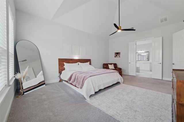 1105 Collared Dove Dr, Little Elm, TX 75068 - bedroom featuring carpet floors, high vaulted ceiling, connected bathroom, multiple windows, and baseboards