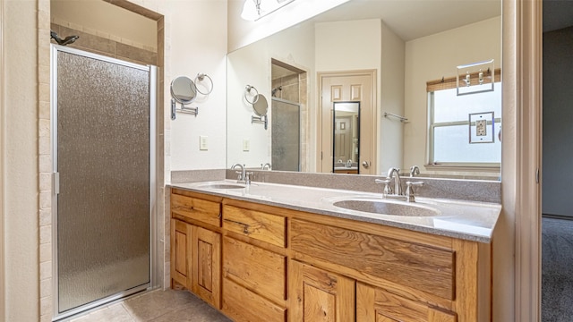 810 Prairie Wind Blvd, Stephenville, TX 76401 - bathroom featuring a shower stall, tile patterned floors, and double vanity