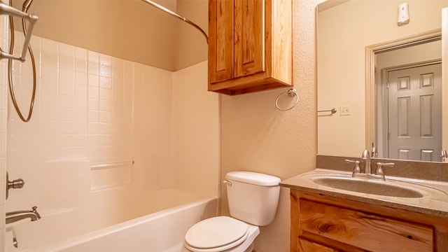 810 Prairie Wind Blvd, Stephenville, TX 76401 - bathroom with toilet, vanity, shower / bath combination, and a textured wall