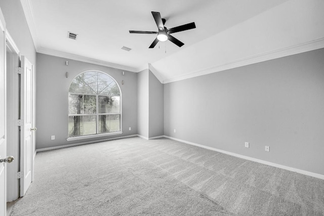 117 Clipper Ct, Rockwall, TX 75032 - carpeted spare room with crown molding, ceiling fan, baseboards, and lofted ceiling