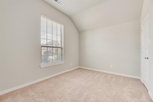 2122 Slow Stream Dr, Royse City, TX 75189 - unfurnished bedroom with light colored carpet, lofted ceiling, and baseboards