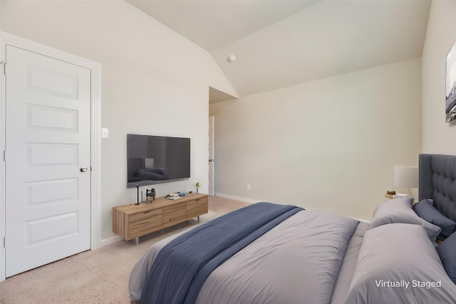 2122 Slow Stream Dr, Royse City, TX 75189 - bedroom with light carpet, vaulted ceiling, and baseboards