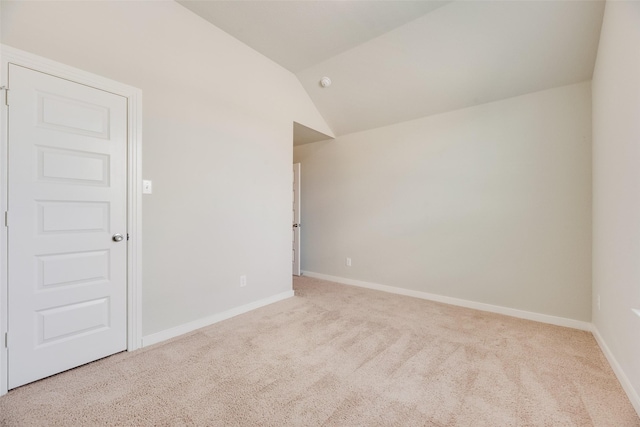 2122 Slow Stream Dr, Royse City, TX 75189 - spare room with carpet floors, baseboards, and vaulted ceiling