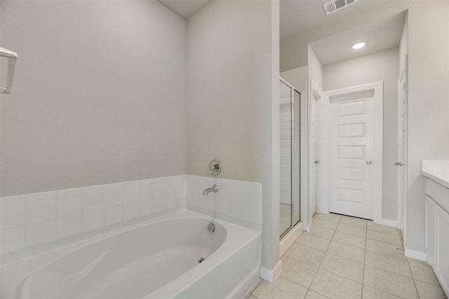 2122 Slow Stream Dr, Royse City, TX 75189 - full bathroom with vanity, tile patterned floors, a stall shower, a bath, and baseboards