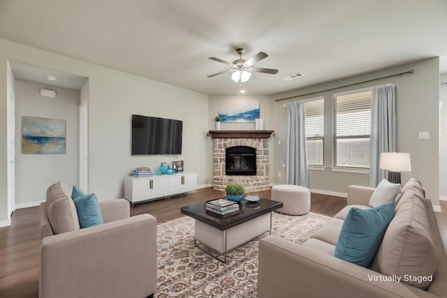 2122 Slow Stream Dr, Royse City, TX 75189 - living room with a ceiling fan, wood finished floors, baseboards, and a fireplace