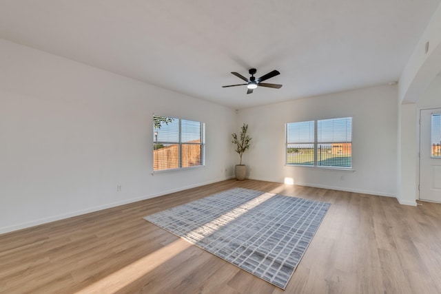 3732 Venera St, Fort Worth, TX 76106 - unfurnished room with light wood-style flooring, a ceiling fan, and baseboards