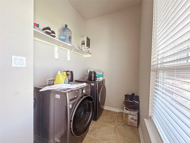 397 Hcr 2341, Abbott, TX 76621 - laundry room with independent washer and dryer, light tile patterned flooring, and baseboards