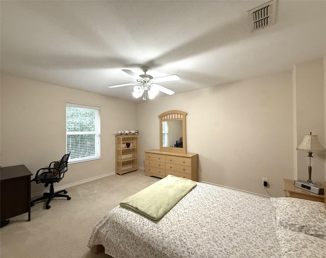 8608 Davis Dr, Frisco, TX 75036 - bedroom with light carpet, baseboards, and ceiling fan