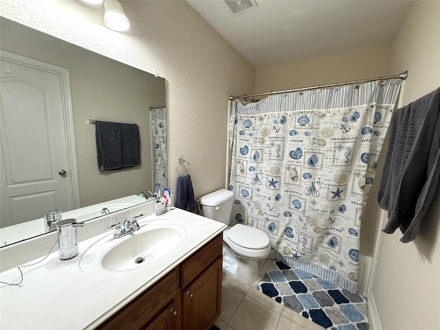 8608 Davis Dr, Frisco, TX 75036 - full bath featuring tile patterned flooring, toilet, and vanity