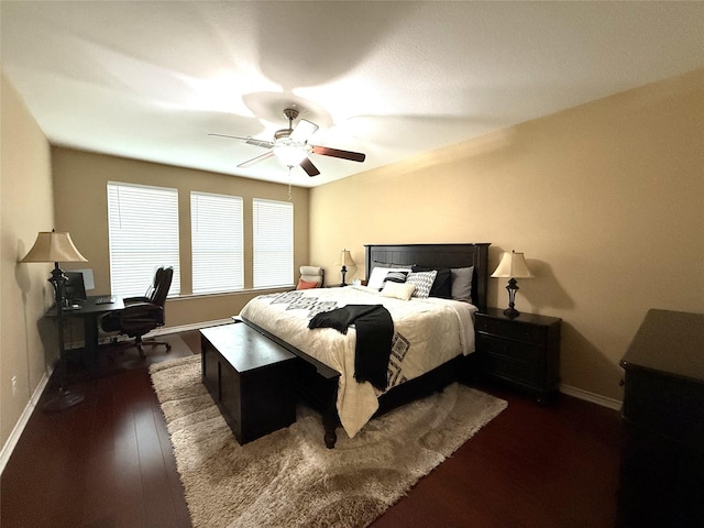 8608 Davis Dr, Frisco, TX 75036 - bedroom with baseboards, wood finished floors, a ceiling fan, and an office area