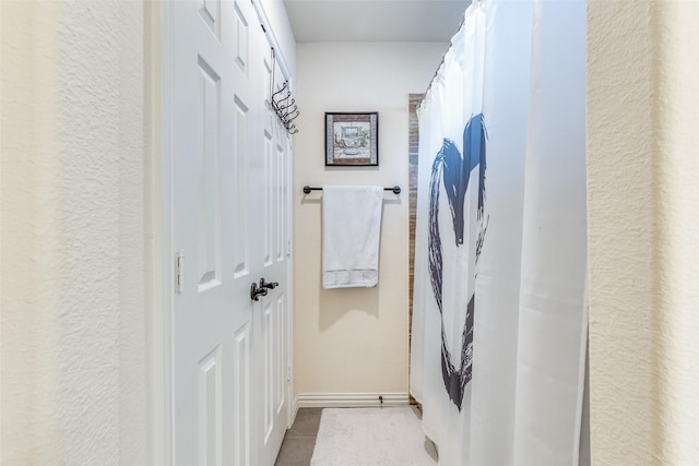 1324 Needle Cactus Dr, Fort Worth, TX 76177 - bathroom featuring tile patterned floors and baseboards