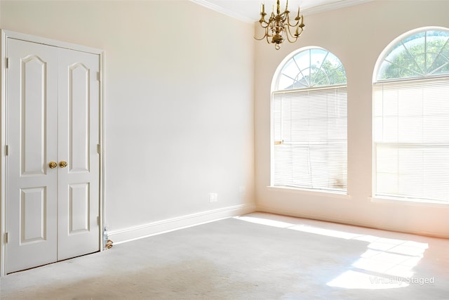 1325 Bentley Dr, Carrollton, TX 75006 - empty room featuring ornamental molding, a chandelier, carpet flooring, and baseboards