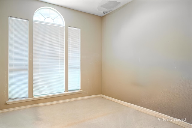 1325 Bentley Dr, Carrollton, TX 75006 - carpeted spare room with baseboards
