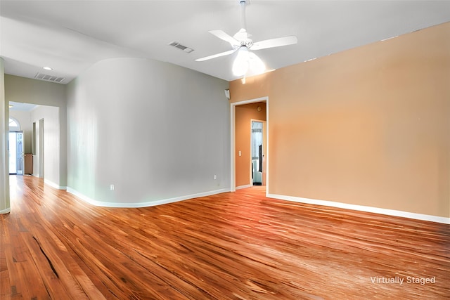 1325 Bentley Dr, Carrollton, TX 75006 - unfurnished room featuring light wood-type flooring, a ceiling fan, lofted ceiling, and baseboards