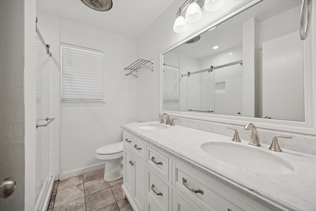 3211 Darby Ln, Denton, TX 76207 - full bath featuring a stall shower, toilet, double vanity, and baseboards