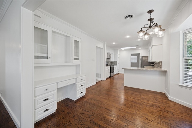 3211 Darby Ln, Denton, TX 76207 - kitchen featuring stainless steel appliances, white cabinetry, glass insert cabinets, tasteful backsplash, and recessed lighting