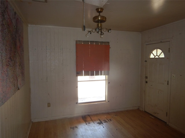 4180 Glenn Rd, Shreveport, LA 71107 - foyer featuring hardwood / wood-style floors, wood walls, and baseboards