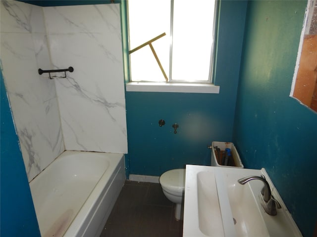 4180 Glenn Rd, Shreveport, LA 71107 - bathroom featuring tile patterned floors, toilet, a bathtub, a shower, and baseboards