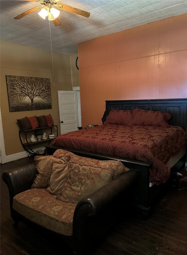 504 E 4th St, Mount Pleasant, TX 75455 - bedroom with wood finished floors and ceiling fan