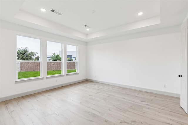 130 Scottish Way, Mansfield, TX 76063 - empty room with a tray ceiling, light wood-style floors, baseboards, and recessed lighting