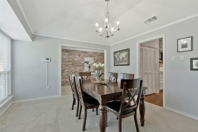 7624 Kevin Dr, Dallas, TX 75248 - carpeted dining area with a chandelier, healthy amount of natural light, ornamental molding, and baseboards